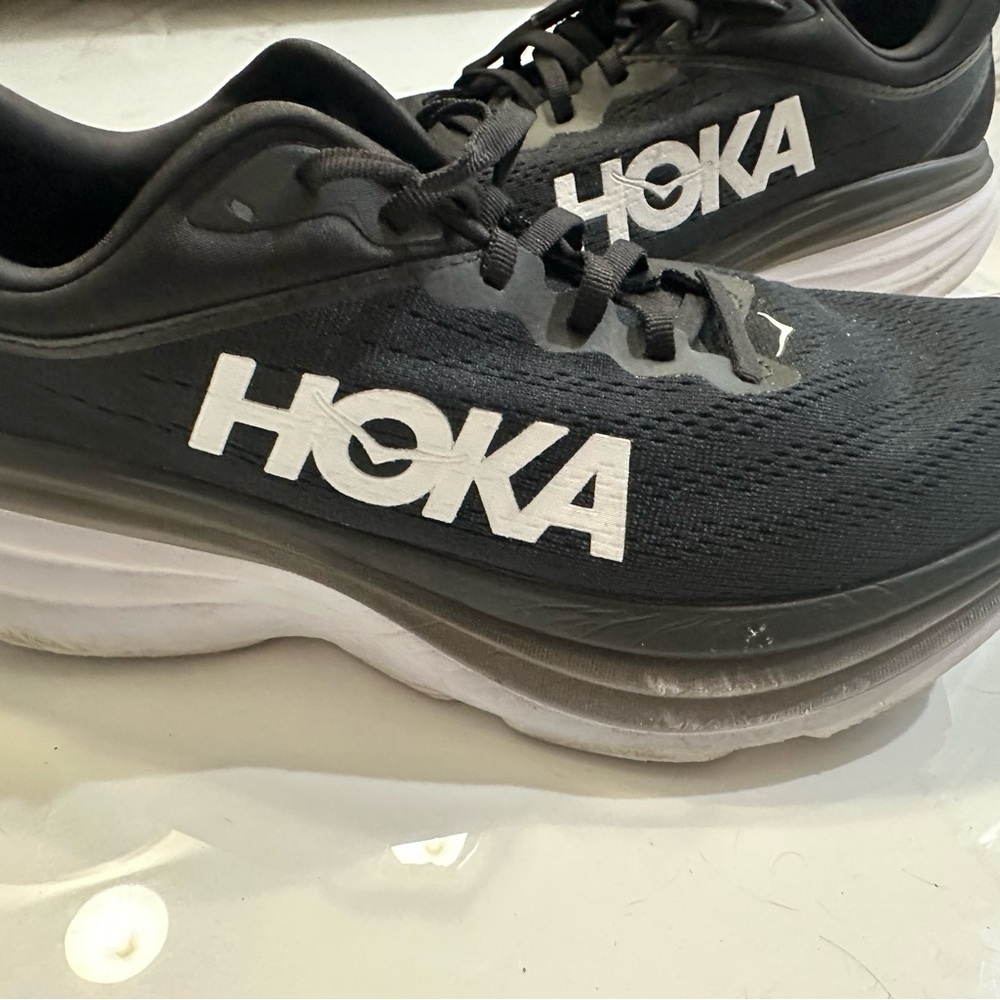 Hoka Black Athletic Shoes with Breathable Mesh and Sleek Design
